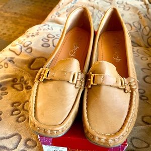 Comfort flats khaki tan color.